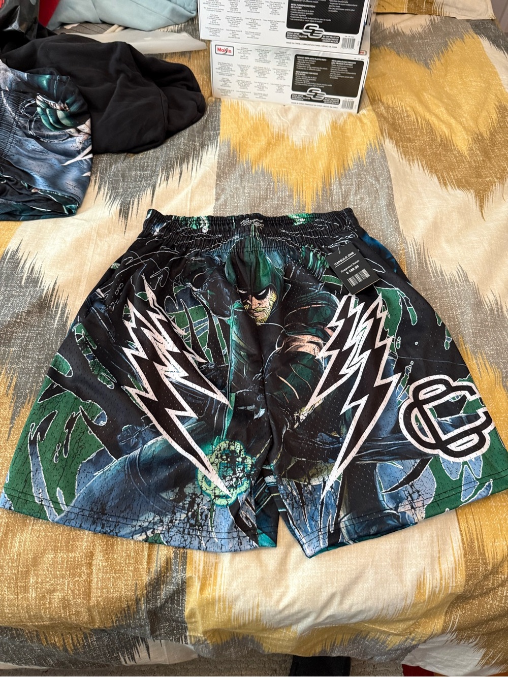 Black & Green Graphic Athletic Shorts with Lightning Accent